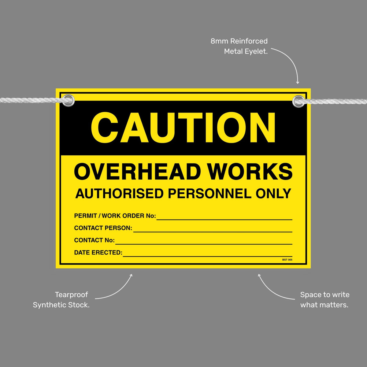 Caution Overhead Works flag tag with callouts showing the 8mm reinforced metal eyelet, tearproof synthetic stock and write in space.
