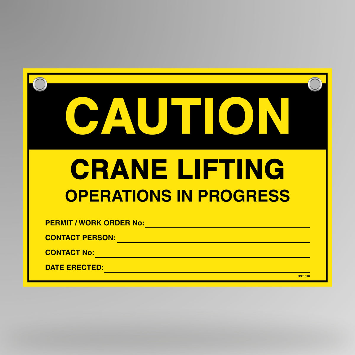 Caution Crane Lifting Operations In Progress flag tag hanging on white bunting rope with metal eyelets, yellow and black design.
