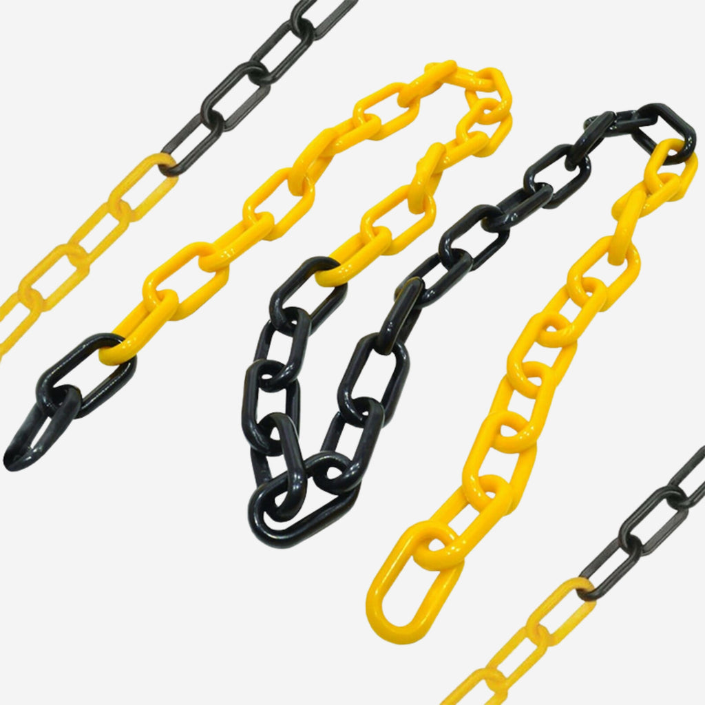 Close up detail of BMT 030 yellow and black plastic safety chain showing alternating yellow and black interlocking oval link construction, suitable for construction, industrial and civil worksite barricading.