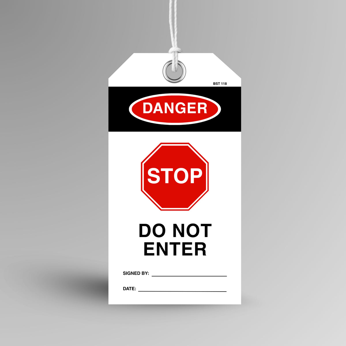 Brute Safety Products BST 118 Danger Stop Do Not Enter safety tag, 75x145mm, showing black header with red Danger oval, red octagonal stop symbol, do not enter warning text, and signed by and date fields. Attached white cord and reinforced metal eyelet visible.