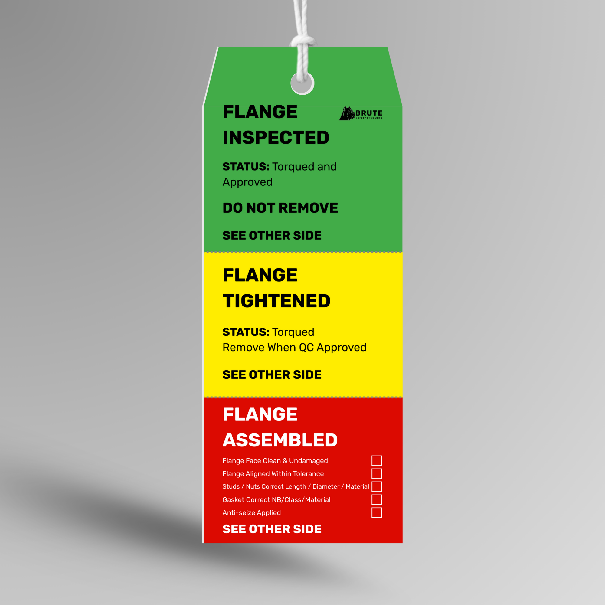 Color-coded inspection tag with text on a gray background