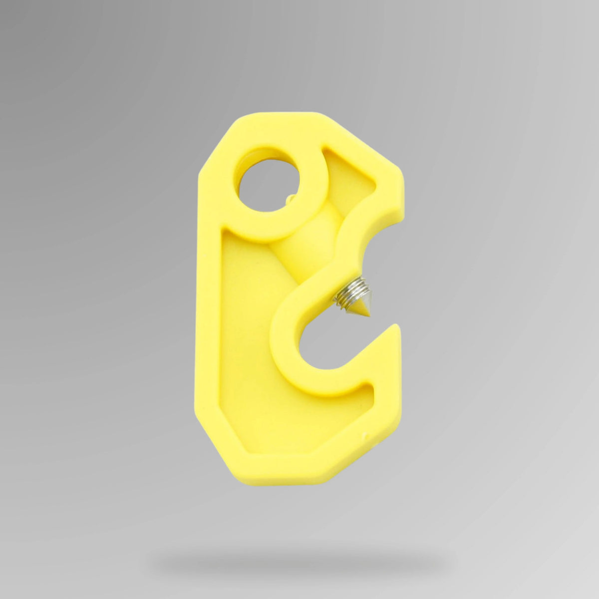 Yellow circuit breaker lockout BLT 009 shown upright for 44mm single pole LOTO applications with high visibility