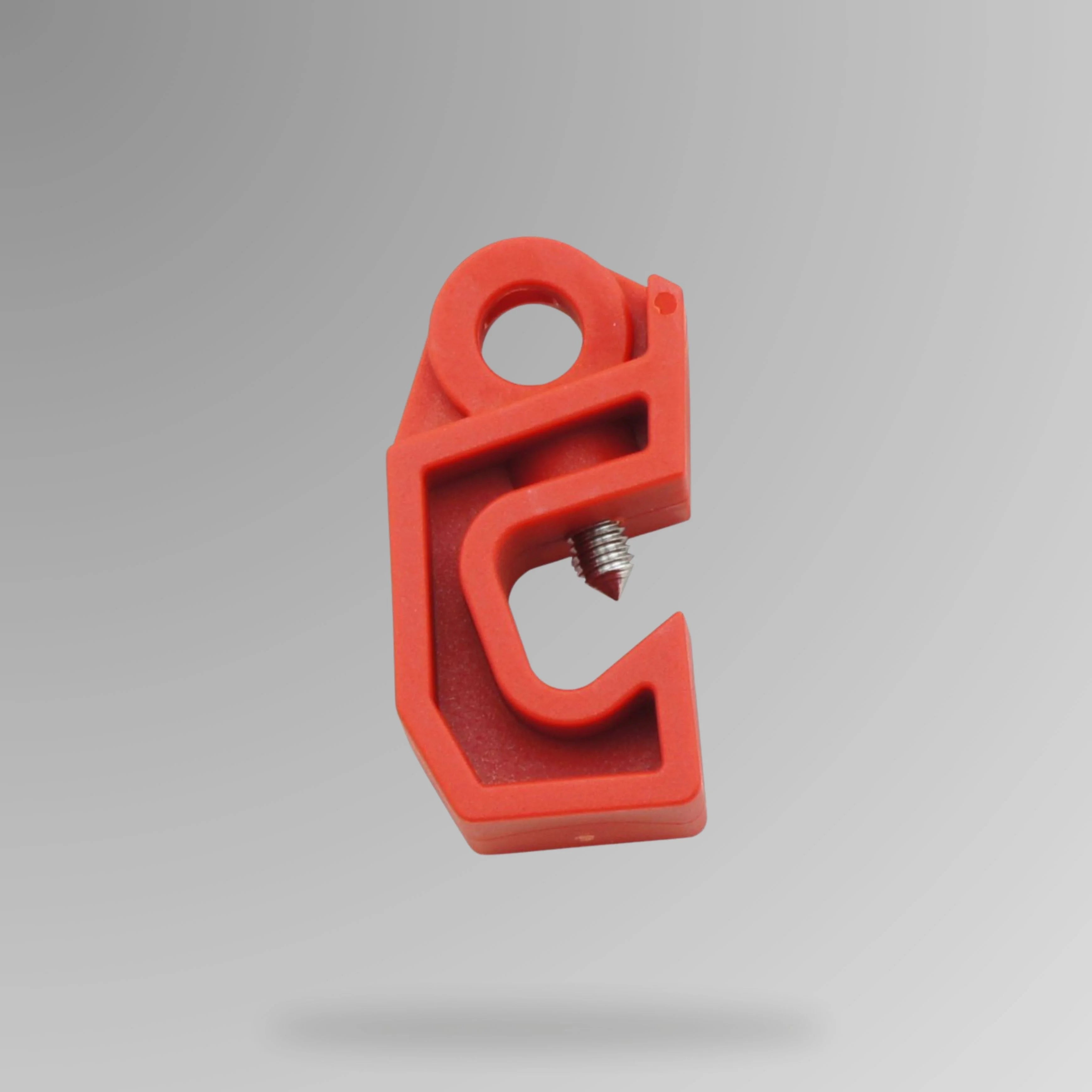 Red circuit breaker lockout BLT 010 shown upright for 49mm multi pole LOTO applications on 2 to 4 pole breakers