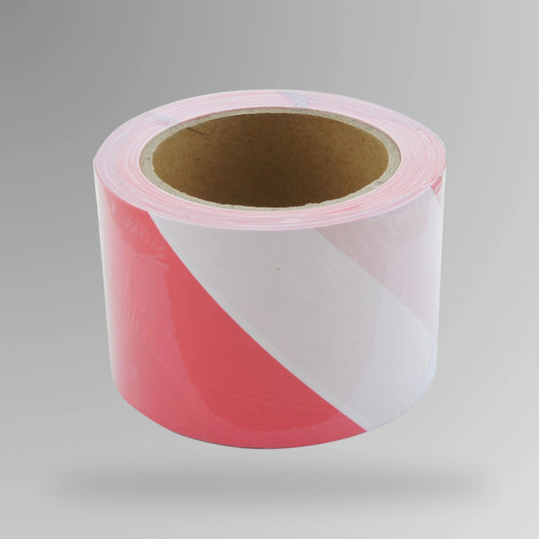 Upright roll of red and white striped barrier tape showing alternating colour pattern and text printing on polyethylene material