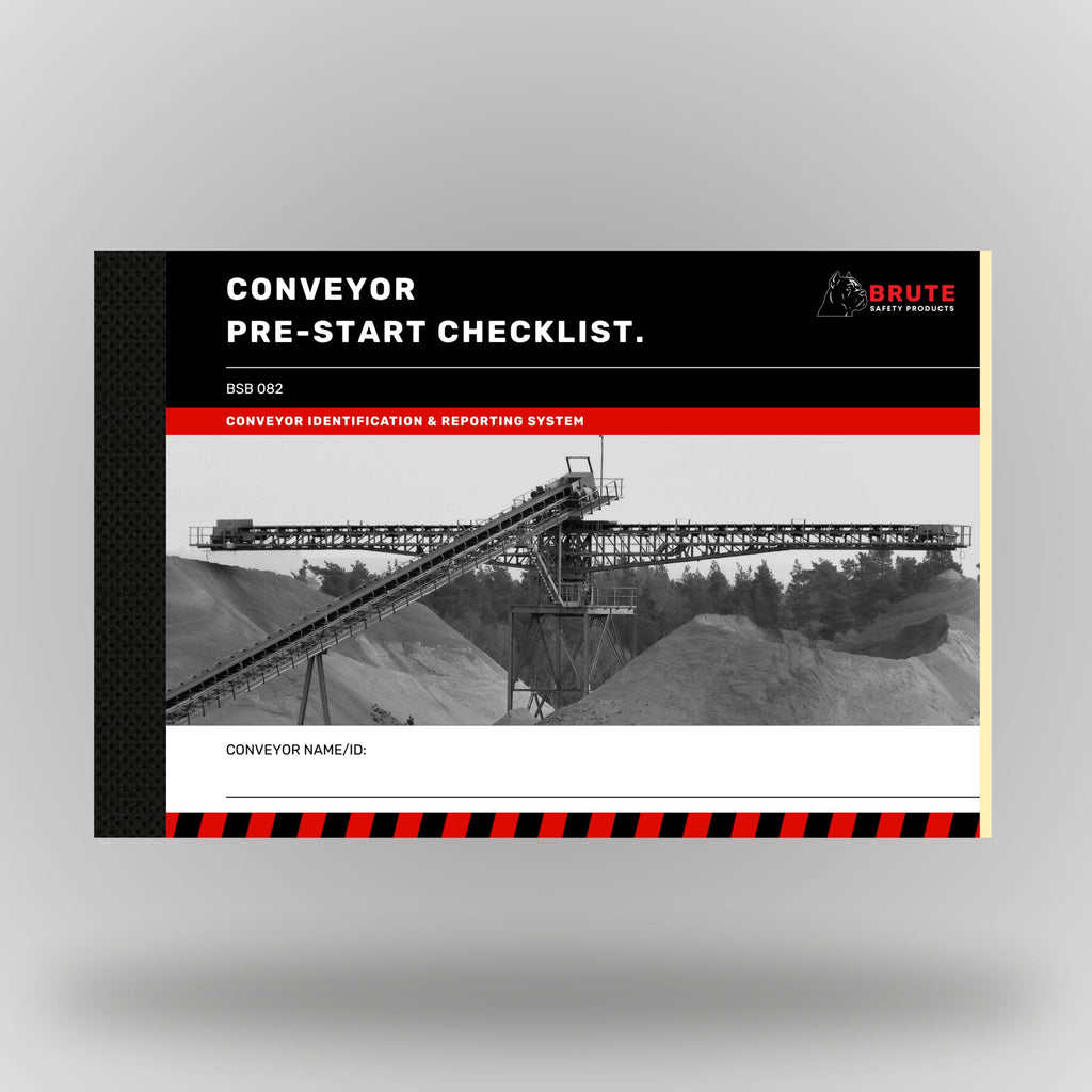 Brute Safety Products BSB 082 Conveyor Pre-Start Checklist Book in A5 landscape format, showing black cover with red banner, Brute Safety logo and greyscale image of a large overland conveyor system at a quarry or mine site with aggregate stockpiles in the background. Includes conveyor name and ID field.