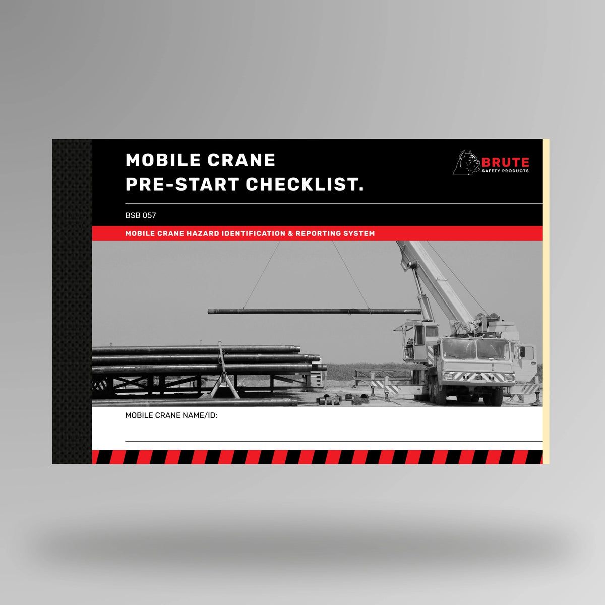 Upright view of BSB 057 Mobile Crane Pre Start Checklist book showing product cover with title and taped spine binding.