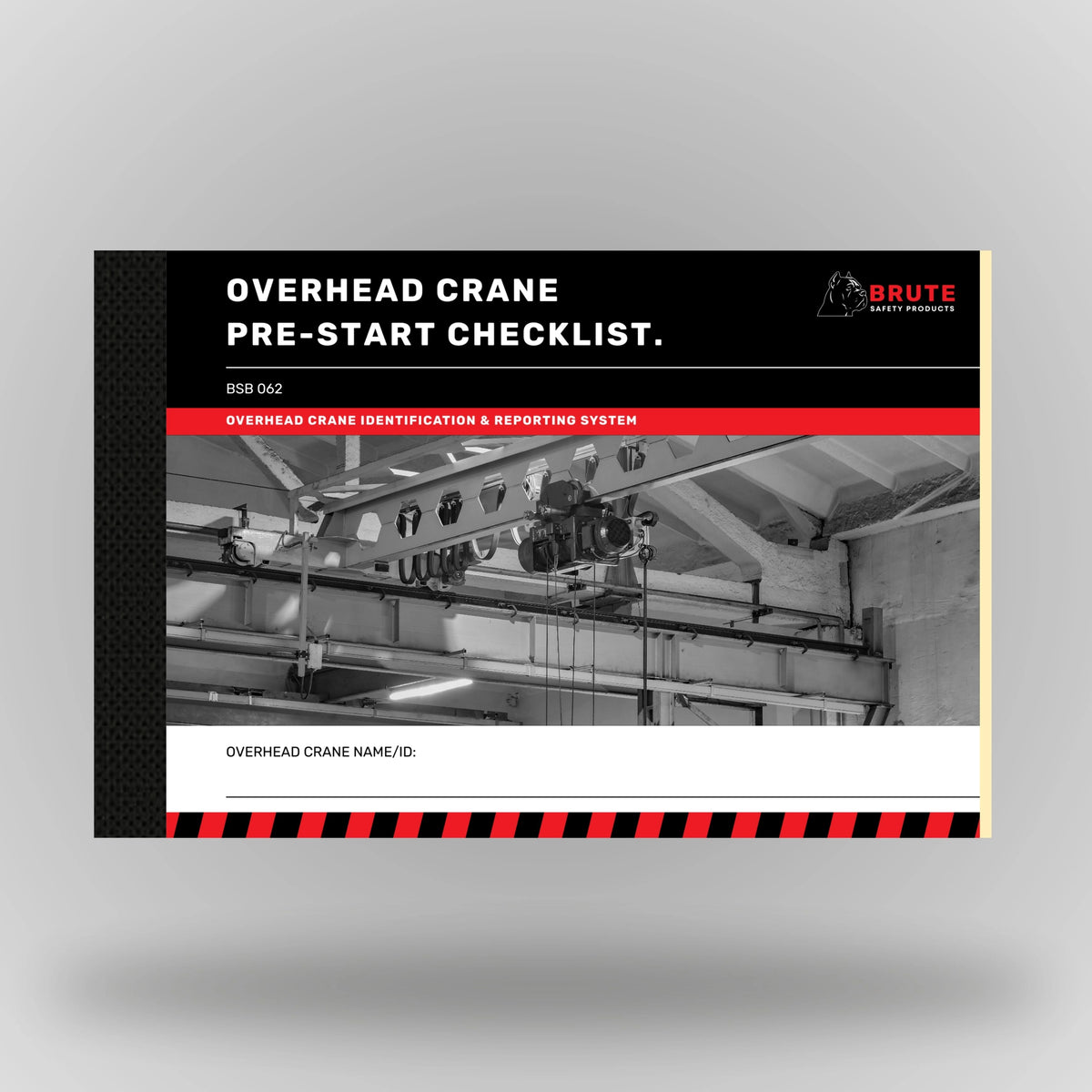 Upright view of BSB 062 Overhead Crane Pre Start Checklist book displaying cover title and taped spine construction.