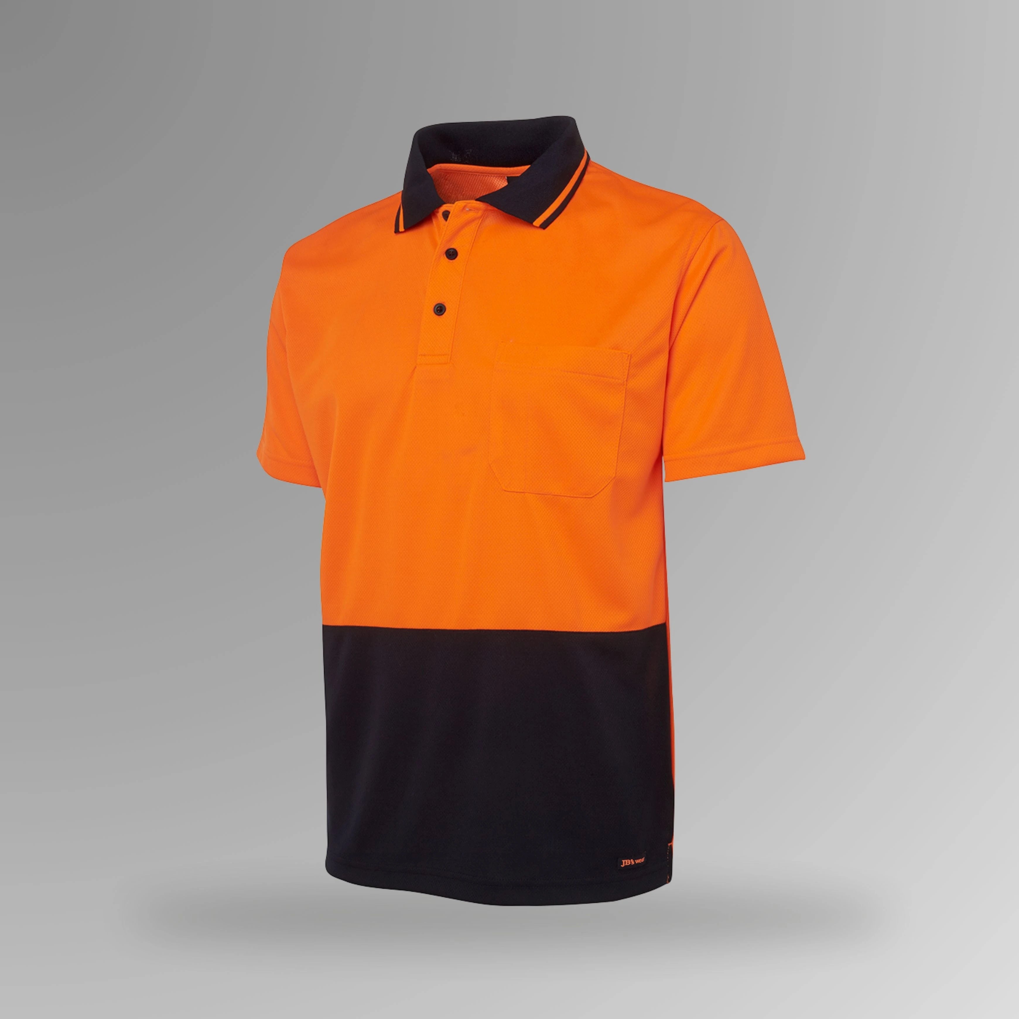 BSC 003 orange and navy hi vis short sleeve polo in upright view displaying fluorescent orange body with navy contrast and reinforced chest pocket with pen holder