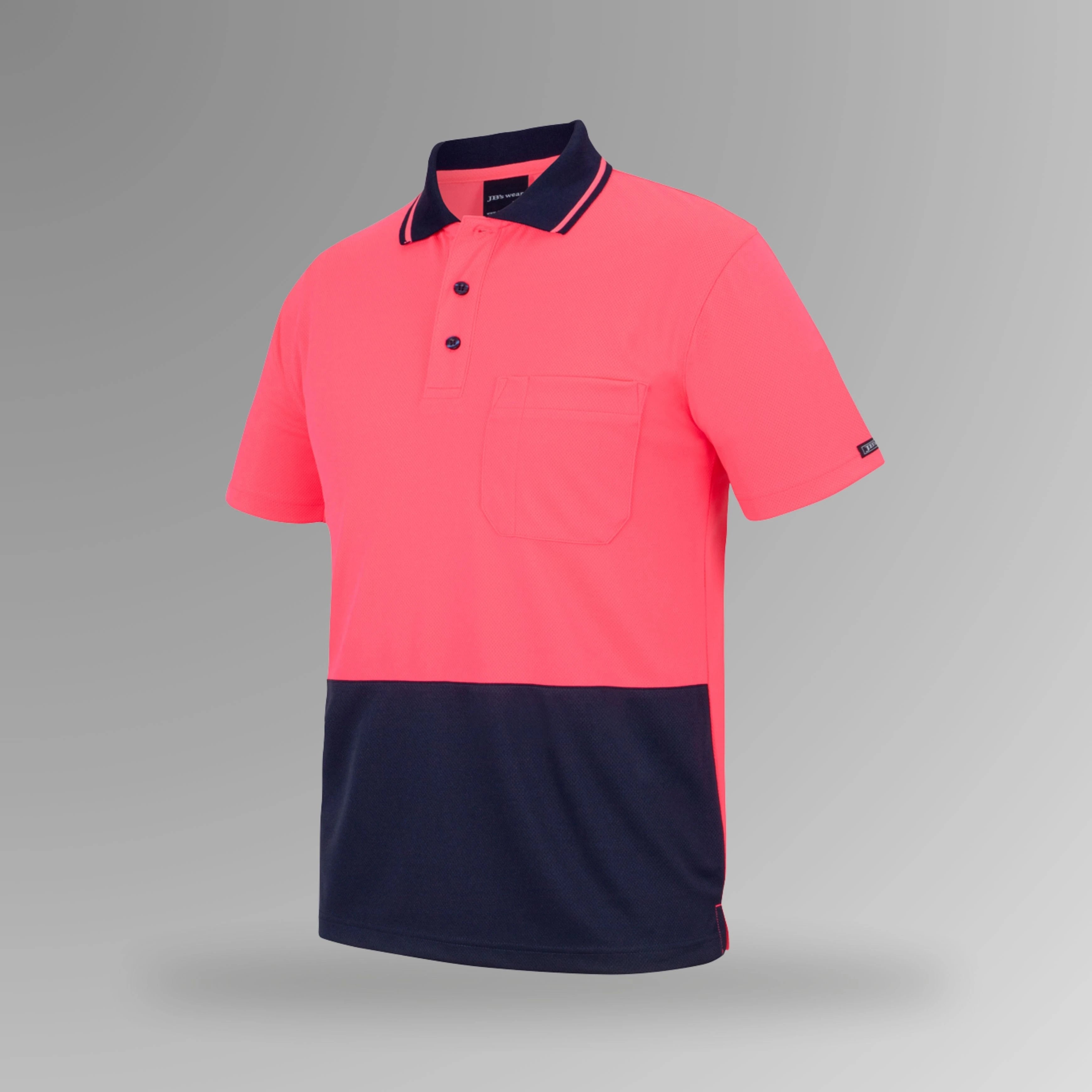 BSC 005 pink and navy hi vis short sleeve polo in upright view showing fluorescent pink body with navy contrast shoulders and reinforced chest pocket with pen insert
