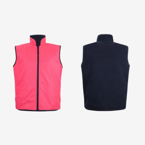 Layflat view of BSC 103 hi vis reversible vest displaying pink high visibility outer shell with waterproof coating and navy polar fleece interior lining