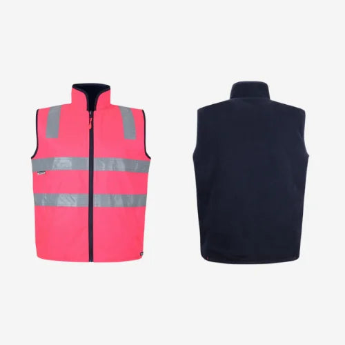 Layflat display of BSC 108 hi vis reversible vest featuring pink outer shell with horizontal reflective tape for night visibility and navy polar fleece interior