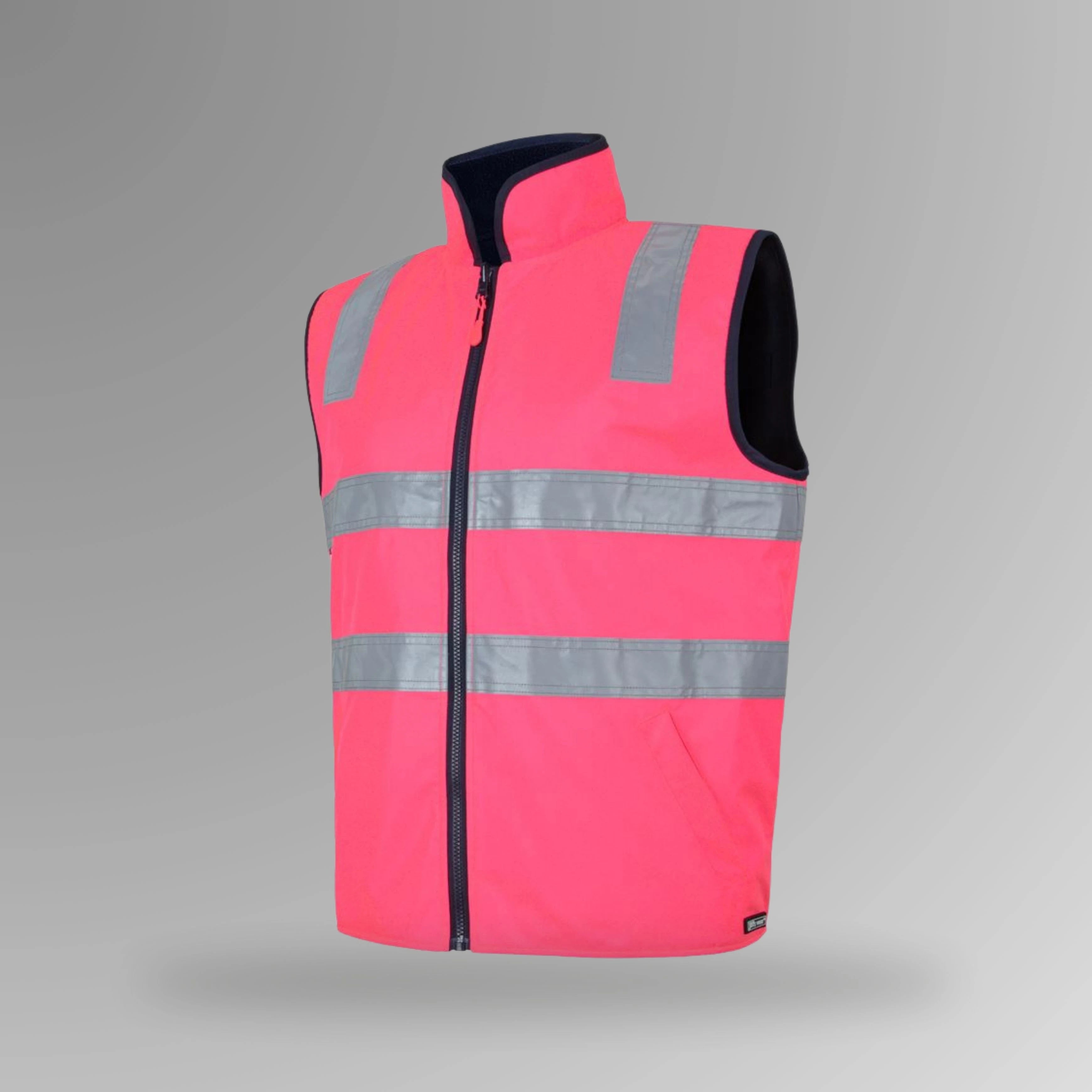 BSC 108 pink and navy hi vis reversible taped vest in portrait view showing fluorescent pink shell with reflective tape strips and navy fleece lining at collar