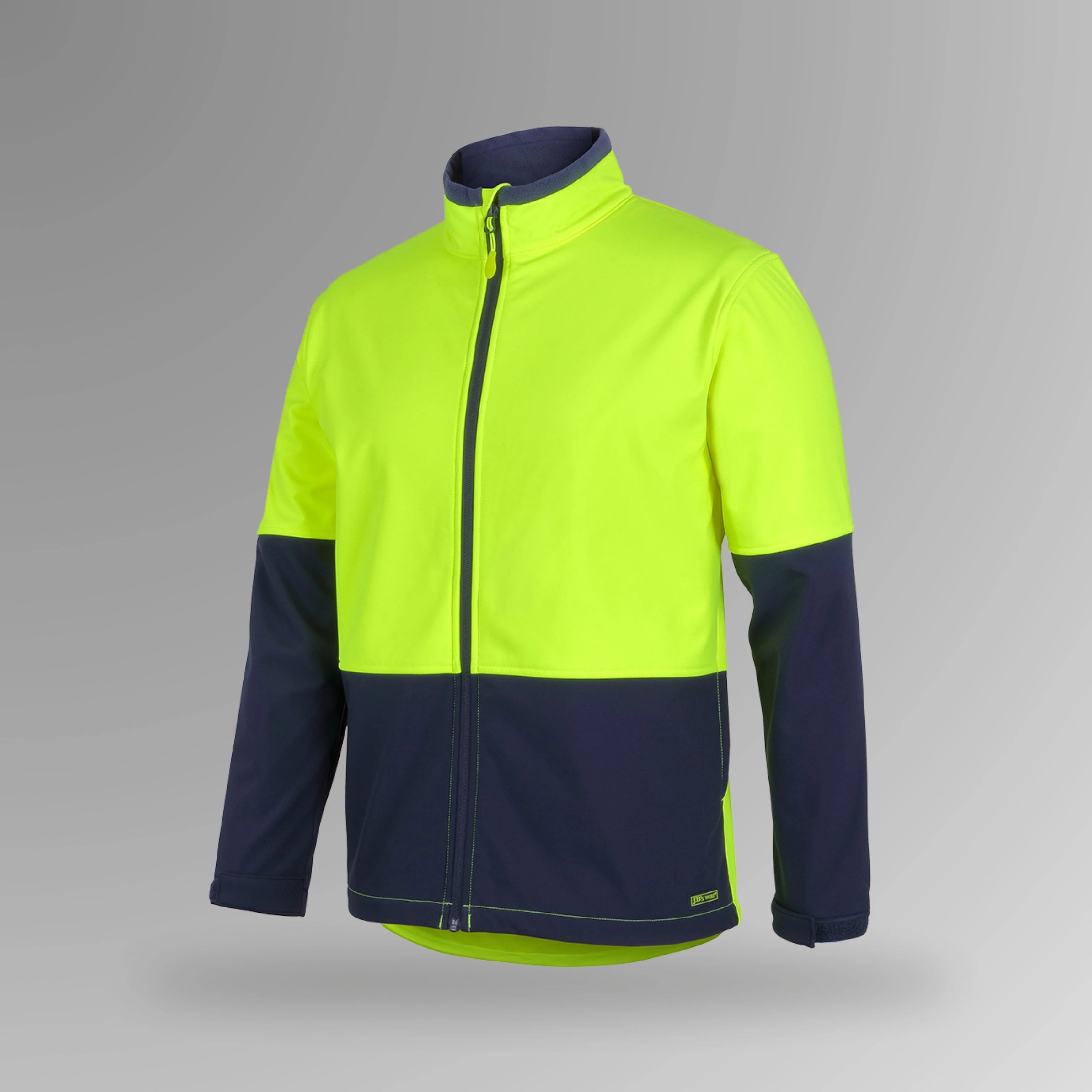 BSC 201 lime and navy hi vis soft shell jacket in portrait orientation showing fluorescent lime body with navy contrast panels and mechanical stretch fabric