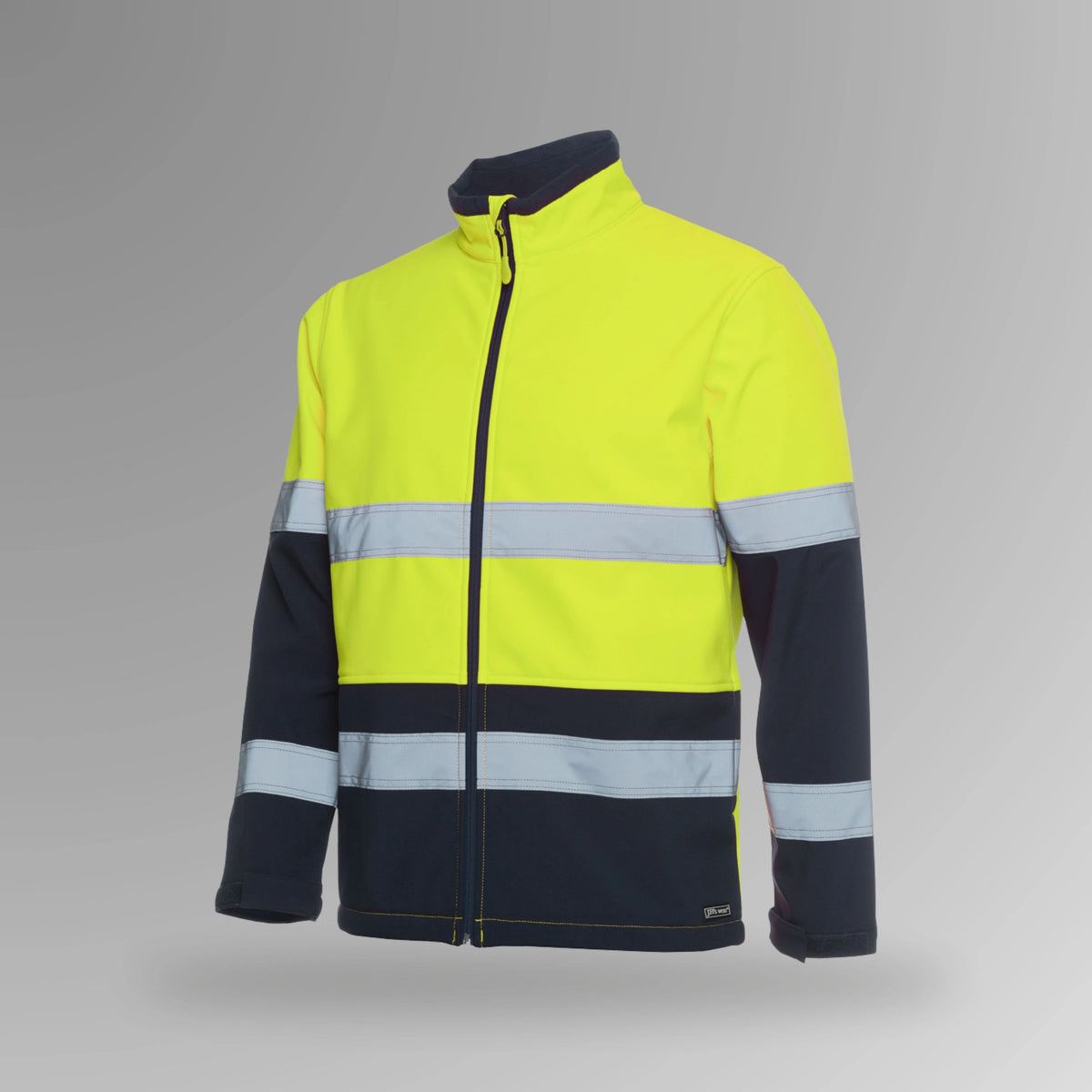 BSC 203 lime and navy hi vis soft shell taped jacket in portrait orientation showing fluorescent lime body with reflective tape in biomotion configuration and navy contrast panels