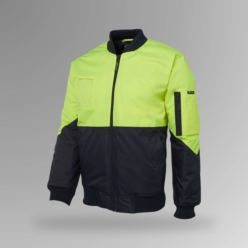 BSC 207 lime and navy hi vis flying jacket in portrait orientation showing fluorescent lime body with navy contrast, chunky rib collar, and front zip closure