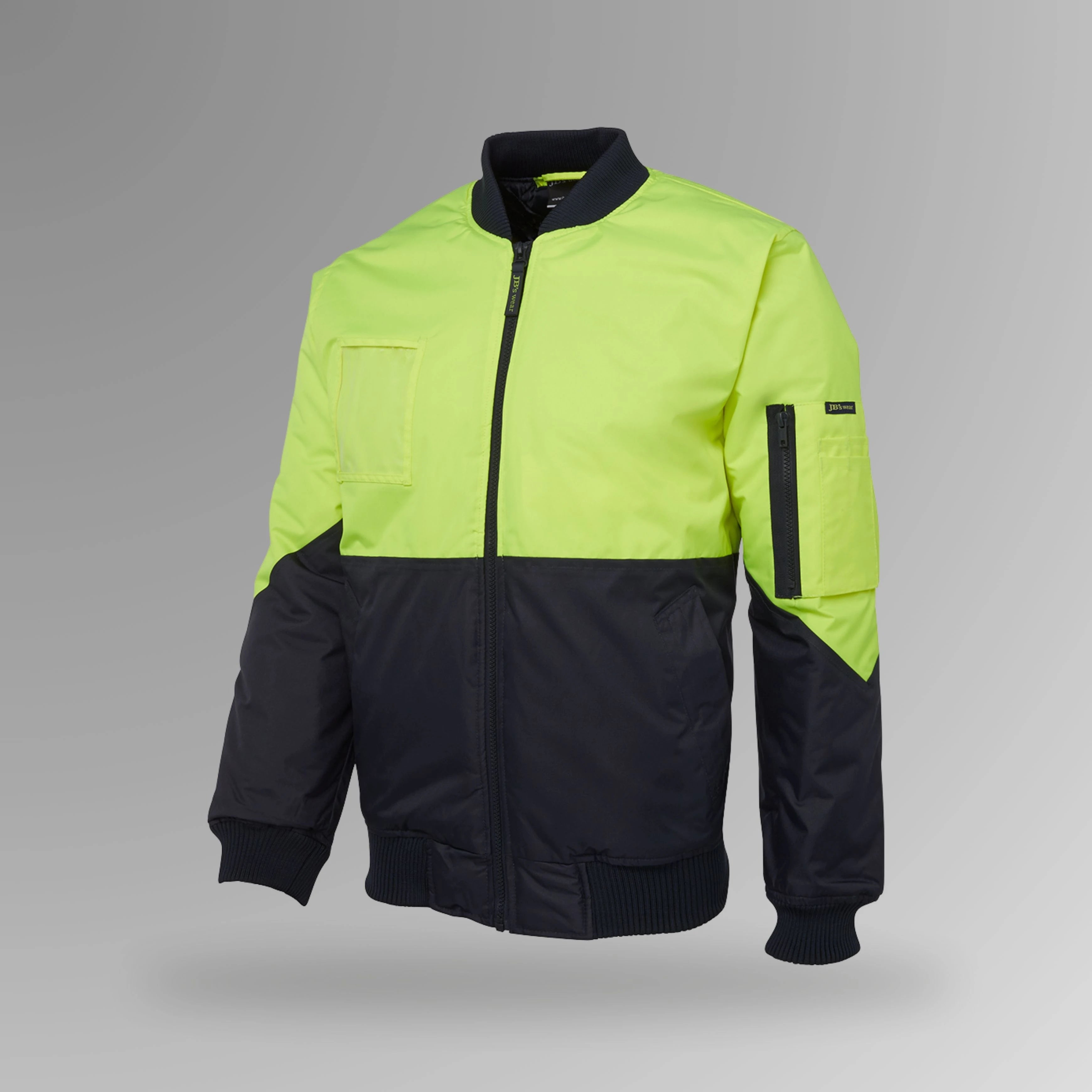 BSC 207 lime and navy hi vis flying jacket in portrait orientation showing fluorescent lime body with navy contrast, chunky rib collar, and front zip closure