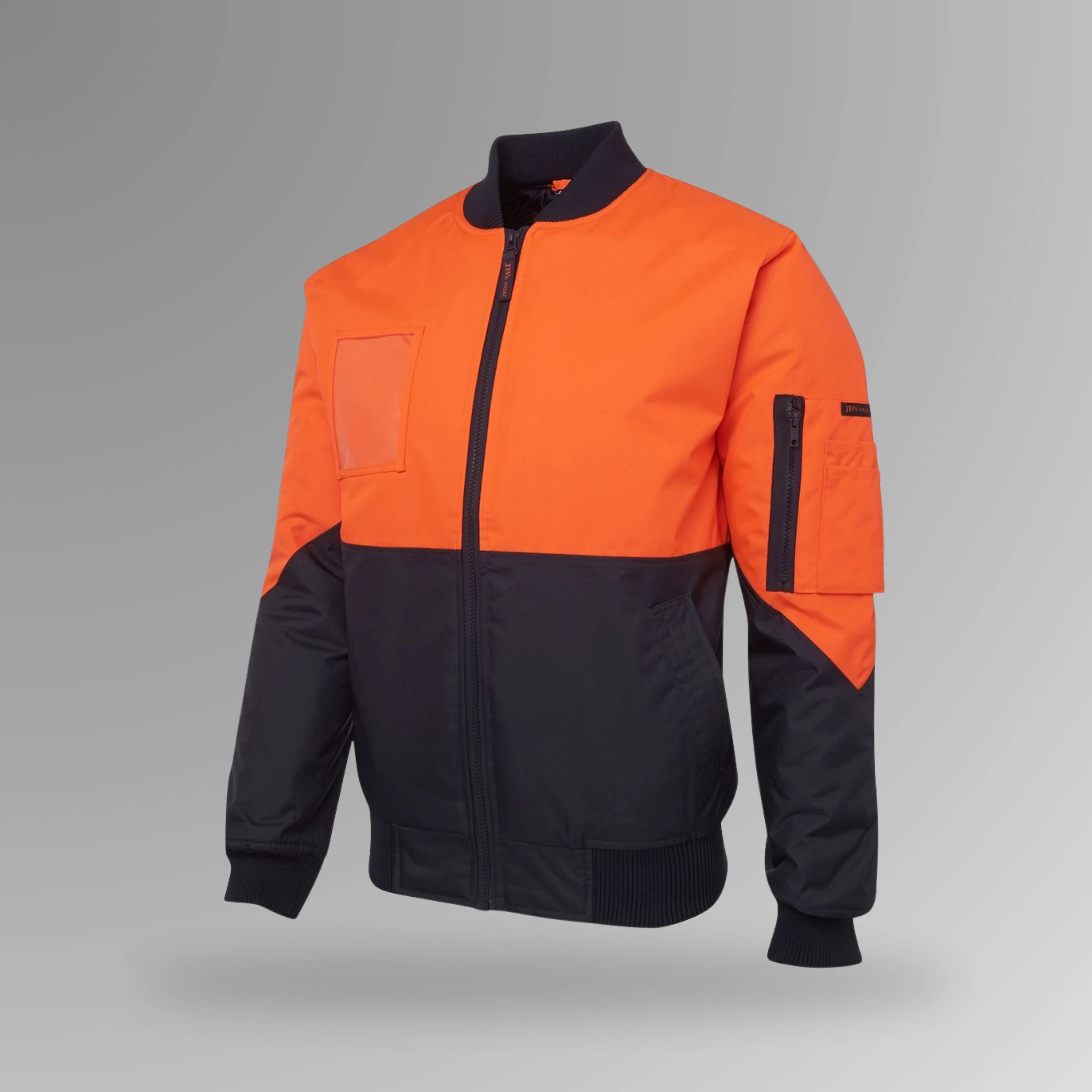 BSC 208 orange and navy hi vis flying jacket in upright view showing fluorescent orange body with navy contrast, chunky rib collar, and multiple pockets