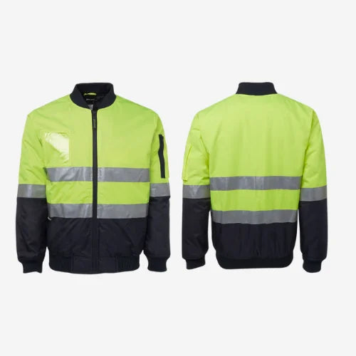 Layflat view of BSC 209 hi vis flying jacket displaying lime shell with reflective tape for night visibility, quilted lining, and rib cuffs