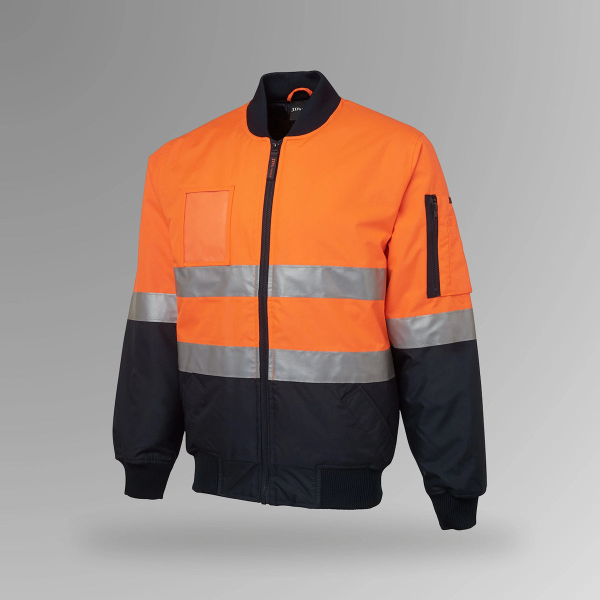 BSC 210 orange and navy hi vis flying taped jacket in upright view showing fluorescent orange body with reflective tape, navy contrast, and chunky rib collar