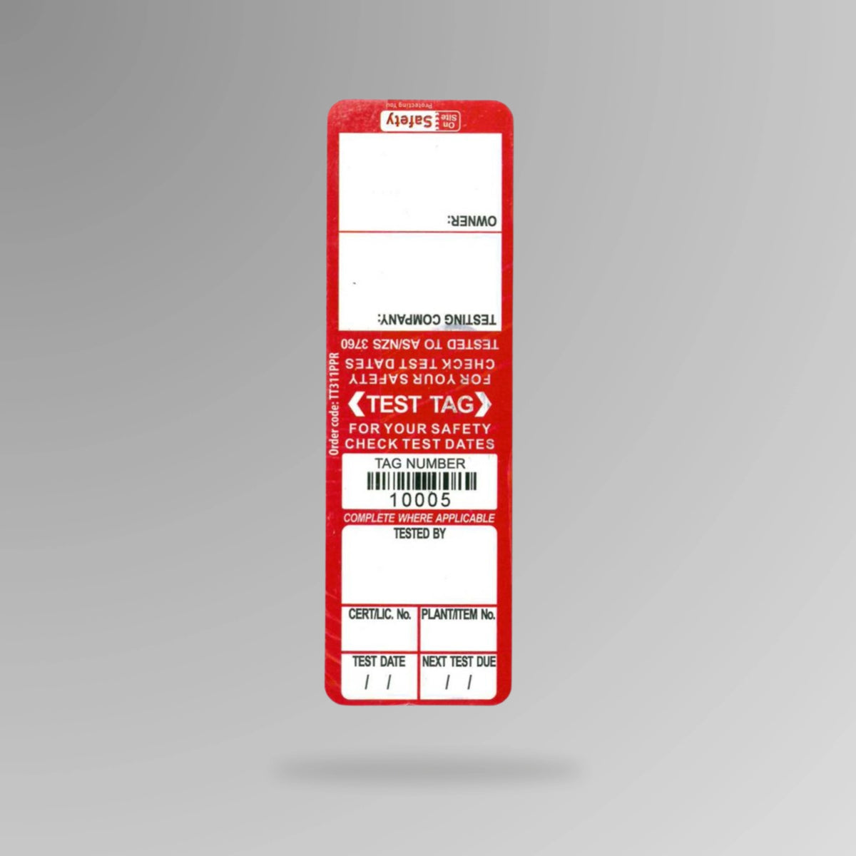 Red BSL 102 test and tag indoor label shown upright displaying electrical testing data fields