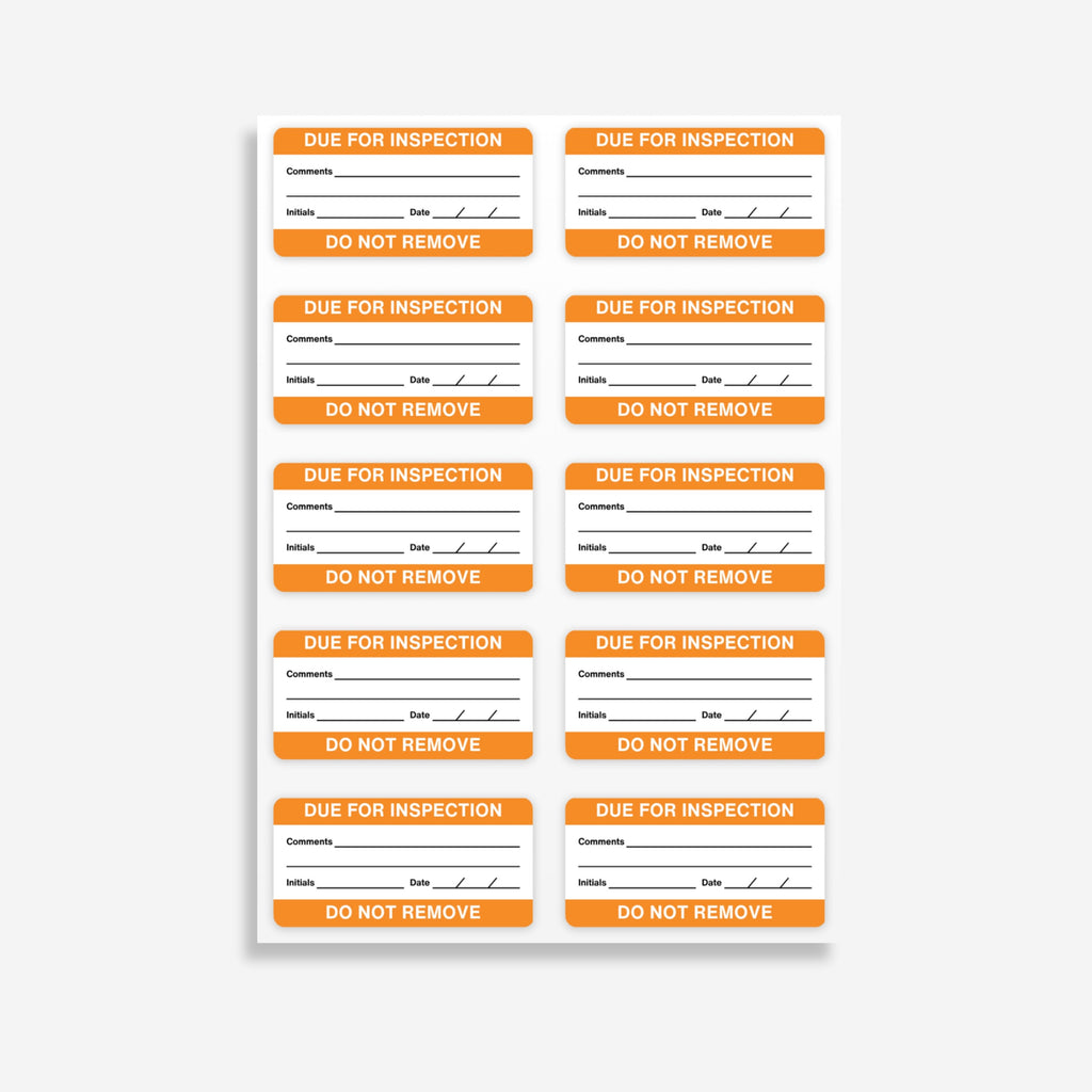 Sheet of BSL 114 due for inspection labels laid flat showing 10 orange labels per sheet with all fields and Do Not Remove footer clearly visible