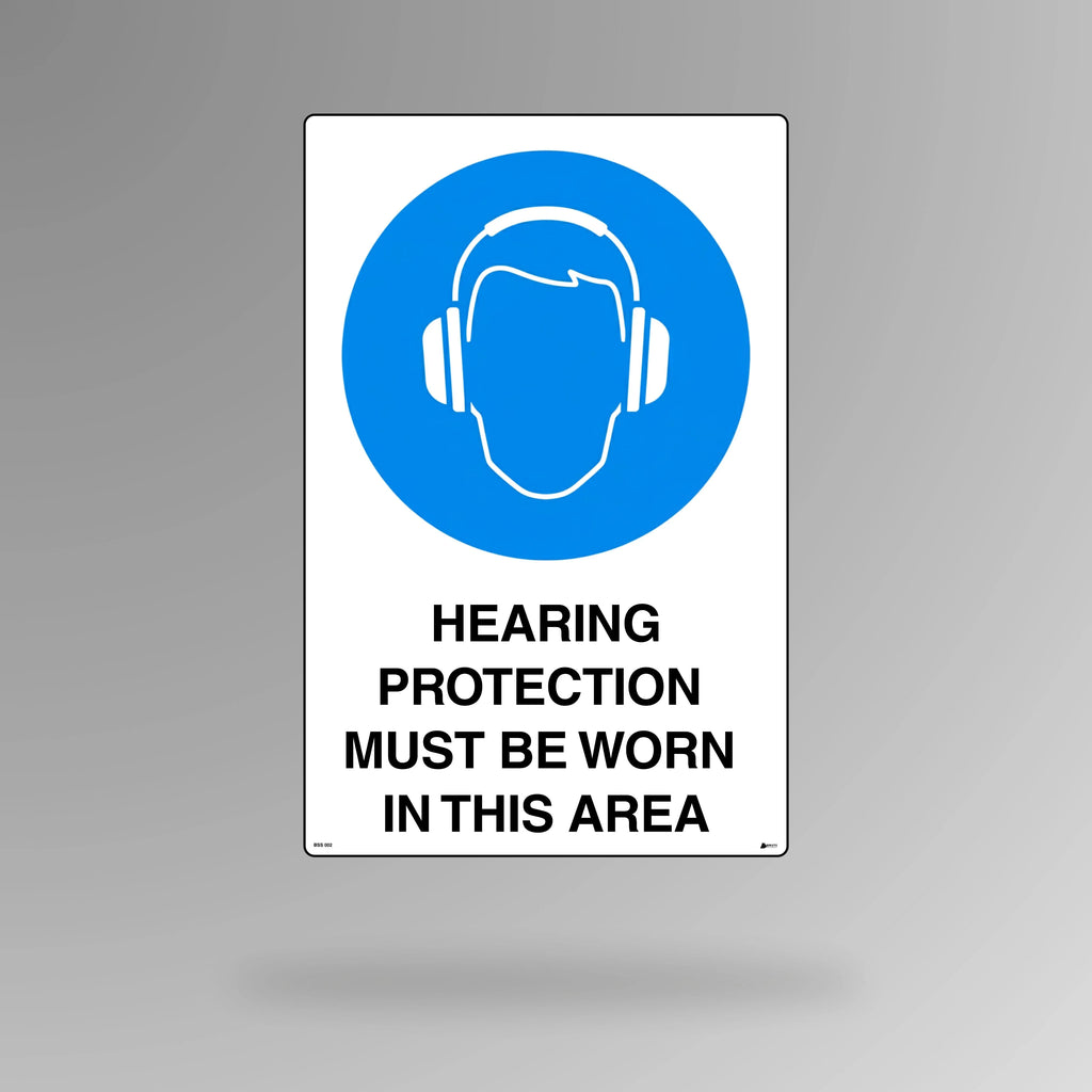 BSS 002 blue and white mandatory safety sign in portrait orientation featuring ear defenders symbol with text stating hearing protection must be worn in this area