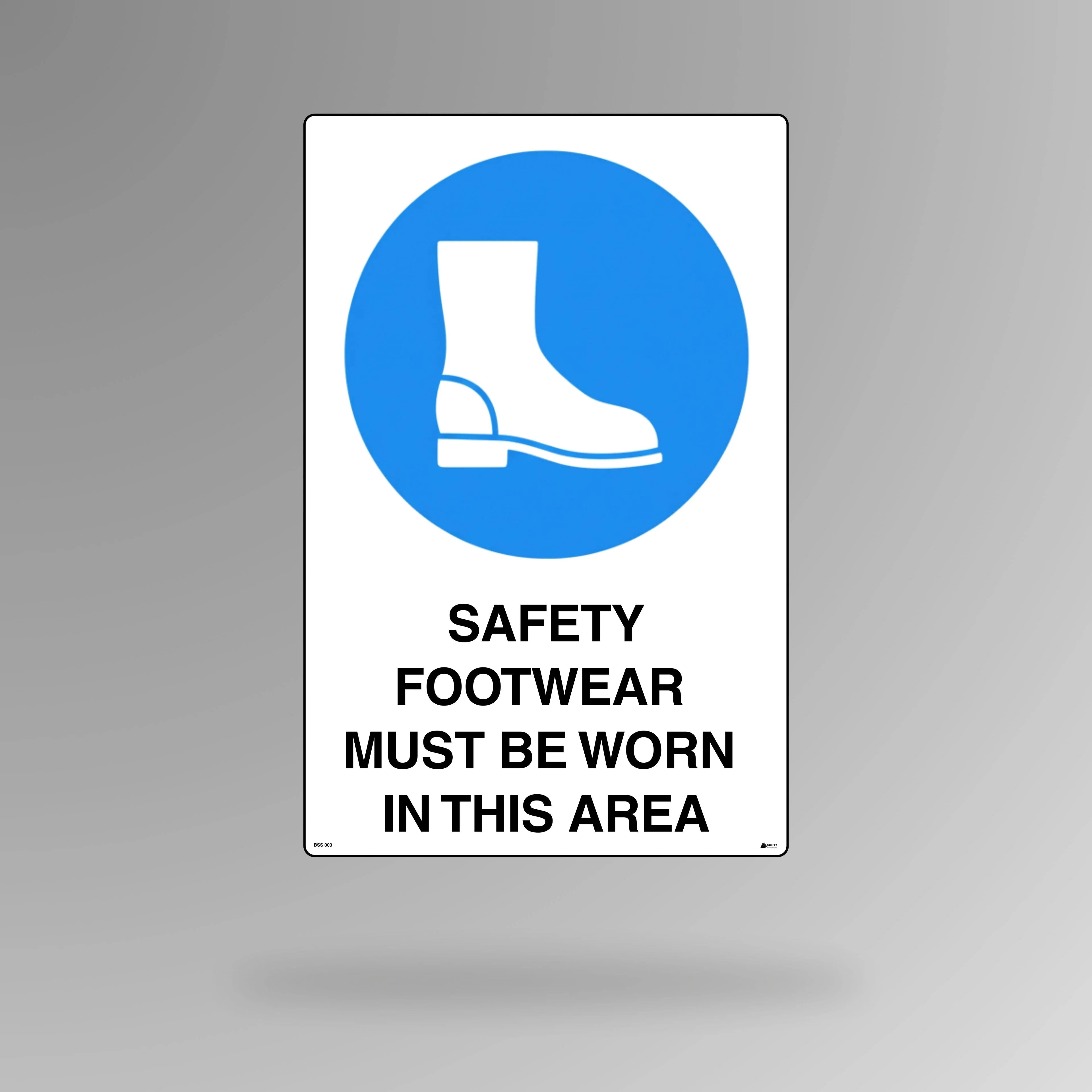 BSS 003 blue and white mandatory safety sign in portrait orientation displaying safety boot symbol with text stating safety footwear must be worn in this area