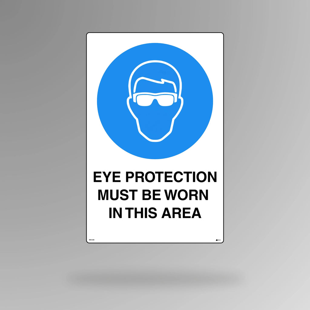 BSS 009 blue and white mandatory safety sign in portrait orientation showing safety glasses symbol with text stating eye protection must be worn in this area