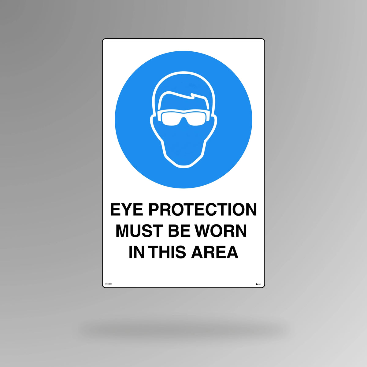 BSS 009 blue and white mandatory safety sign in portrait orientation showing safety glasses symbol with text stating eye protection must be worn in this area