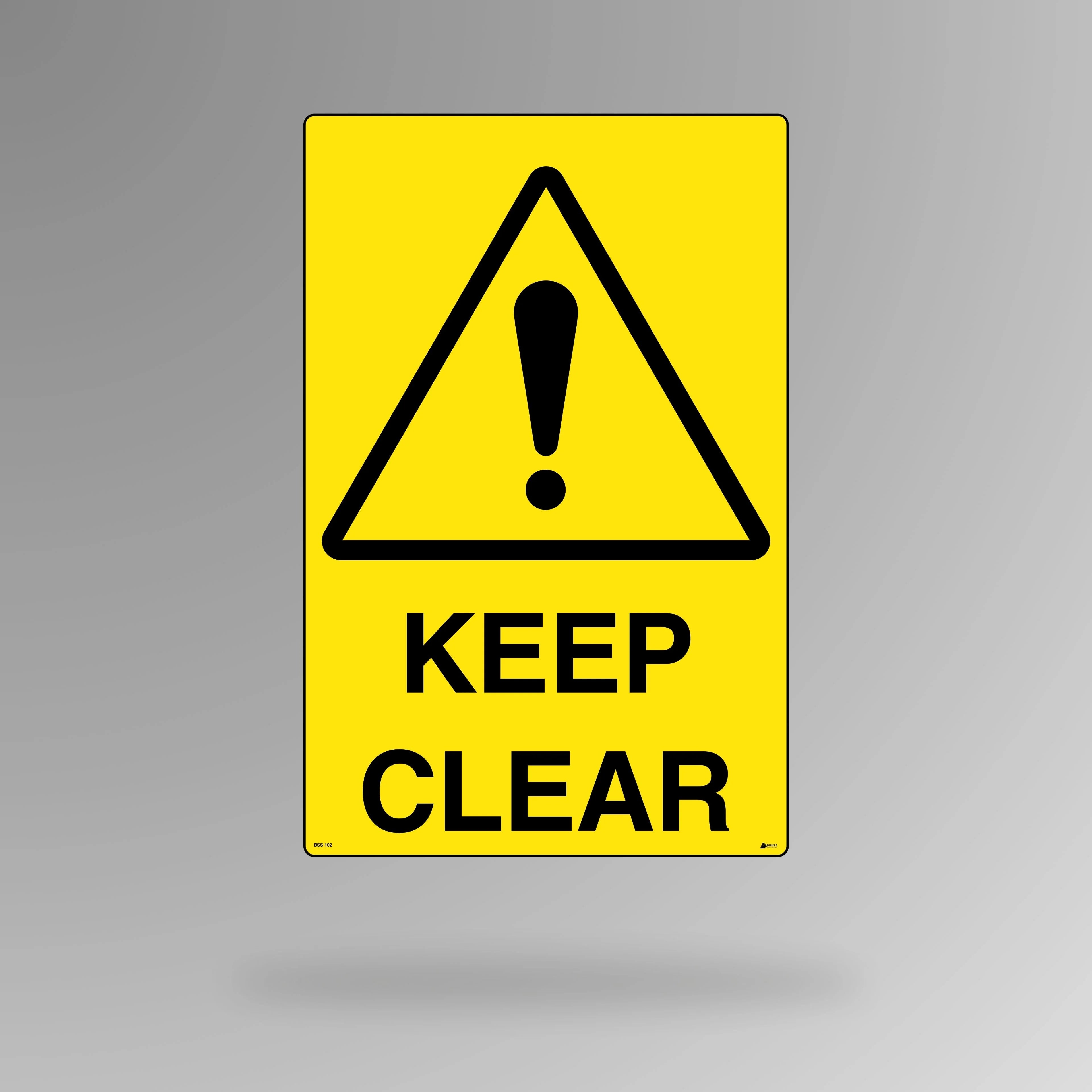 BSS 102 yellow and black warning sign in portrait orientation displaying keep clear text in bold letters for emergency access and clearway areas