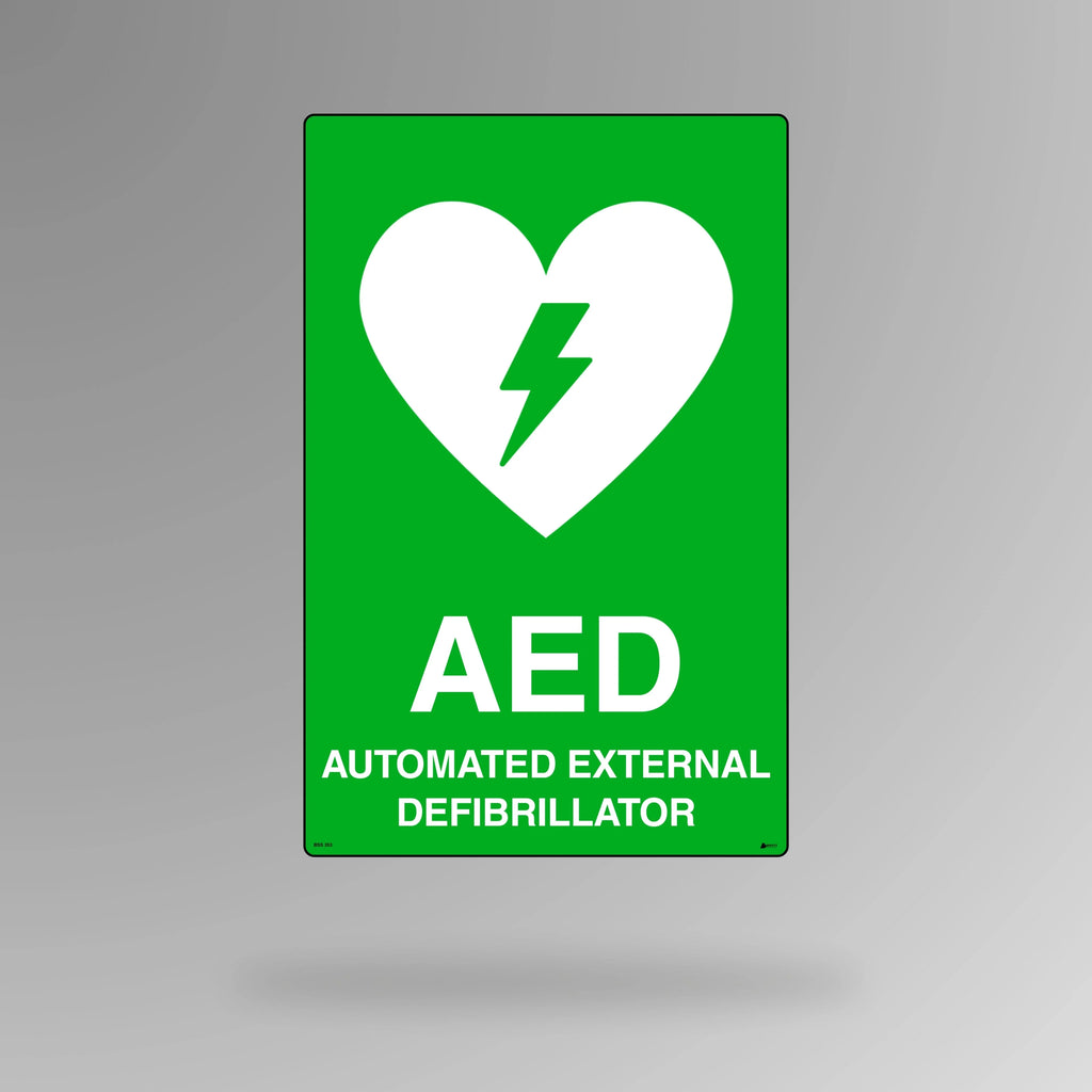 BSS 351 green and white emergency sign in portrait orientation showing first aid cross symbol for quick identification of medical station and kit location