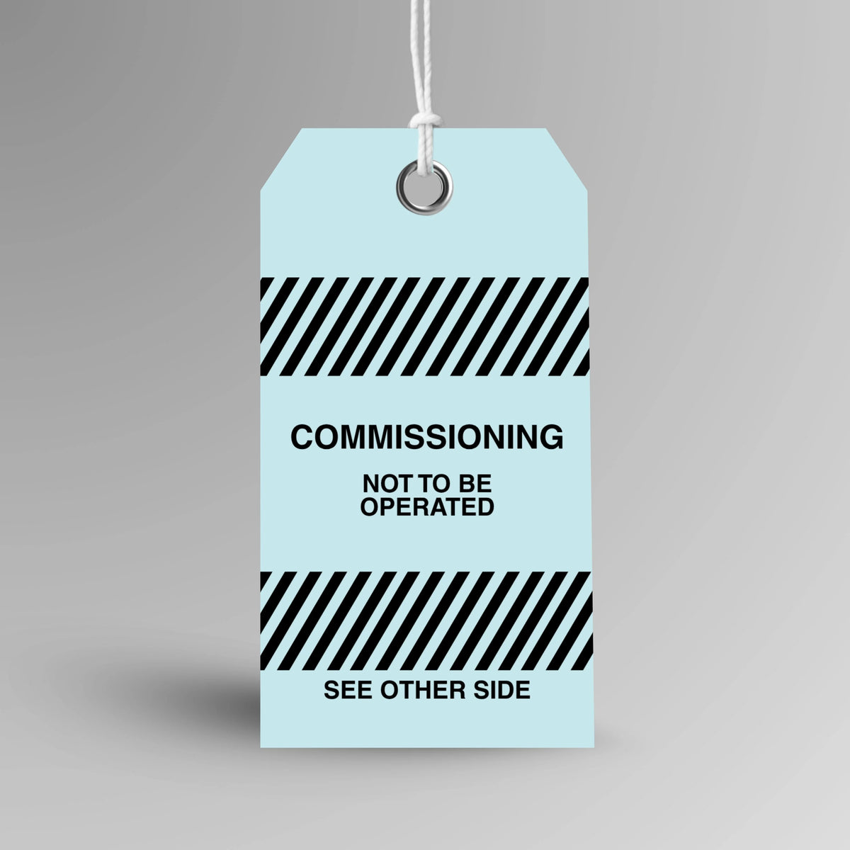 BST 007 Commissioning safety tag in blue, upright view showing complete tag design by Brute Safety Products