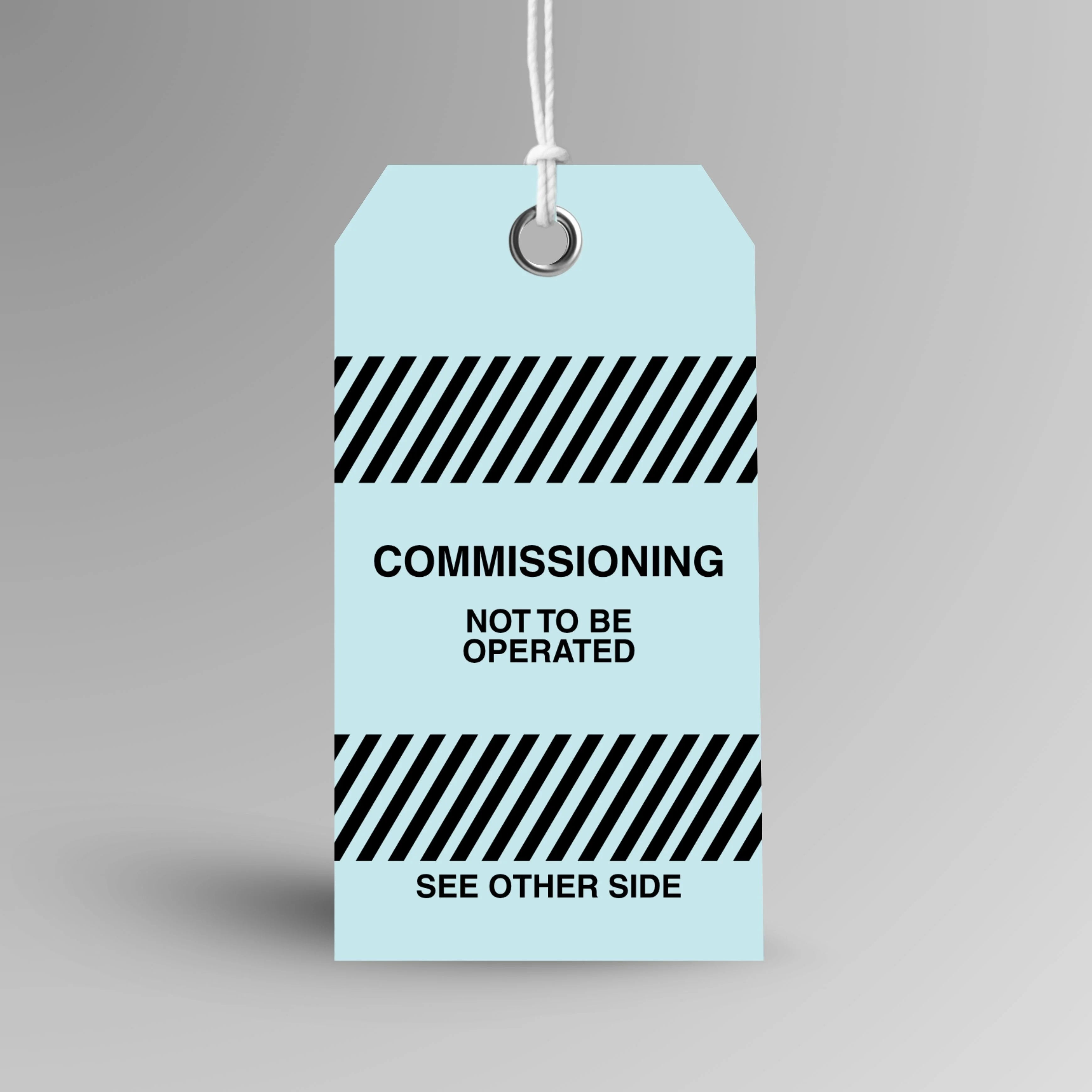 BST 007 Commissioning safety tag in blue, upright view showing complete tag design by Brute Safety Products