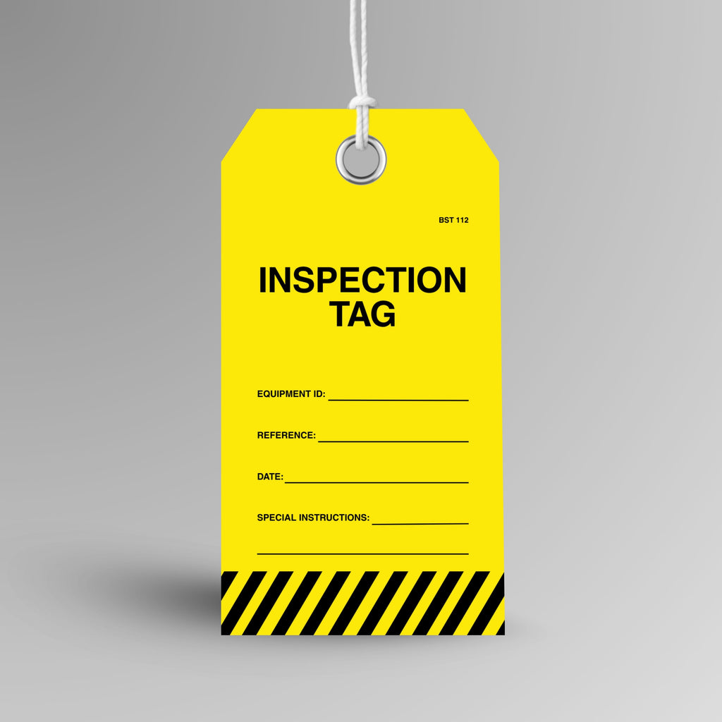 BST 112 Inspection Tag upright view showing yellow and black tag with bold Inspection Tag text, equipment ID, reference, date and special instructions fields on front face