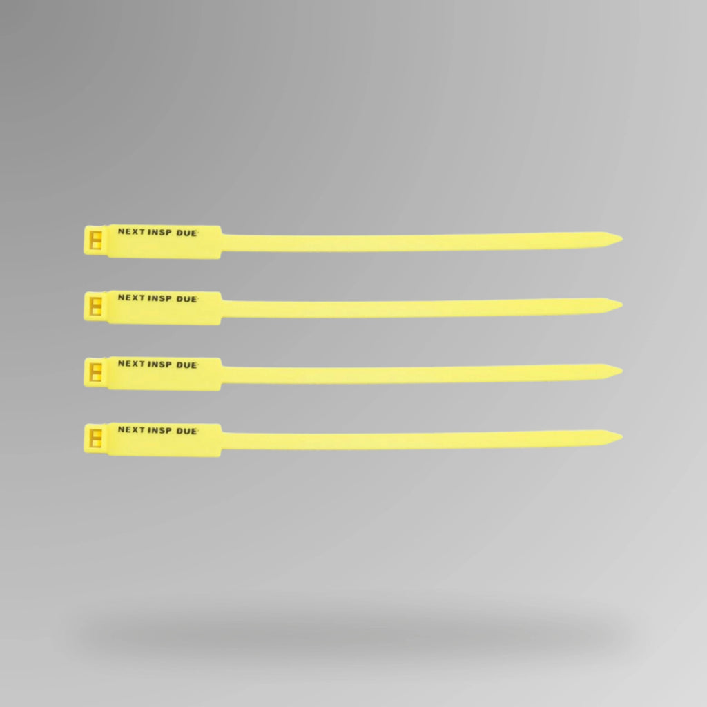 Yellow BST 204 Next Inspection Due rigging tag displayed upright showing clear inspection tracking fields