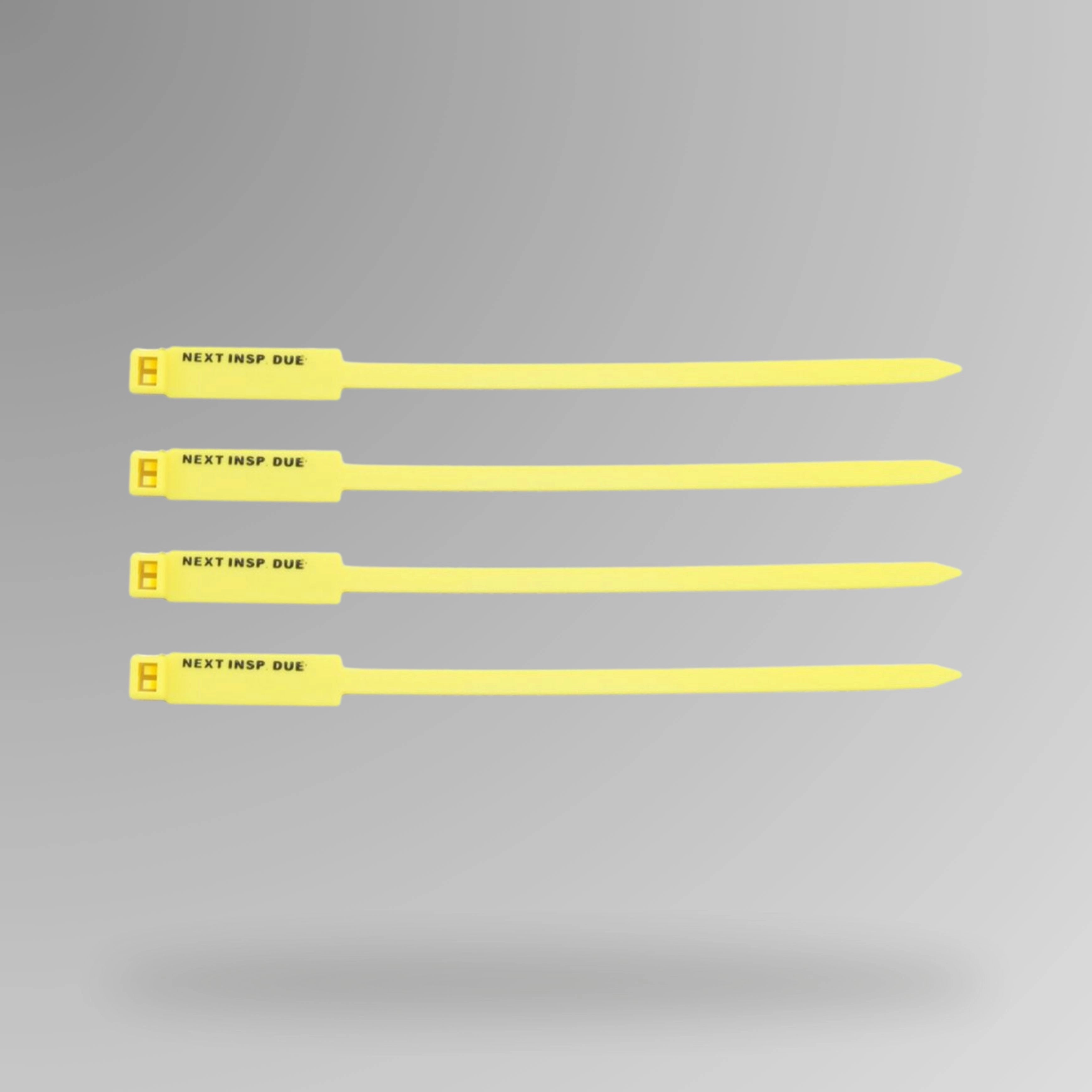 Yellow BST 204 Next Inspection Due rigging tag displayed upright showing clear inspection tracking fields