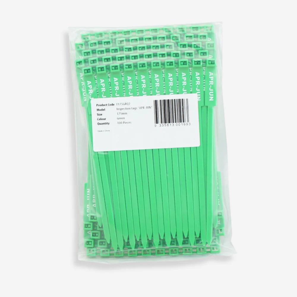 BST 206 green quarterly inspection tag shown flat revealing complete tag 
surface and Q2 identification