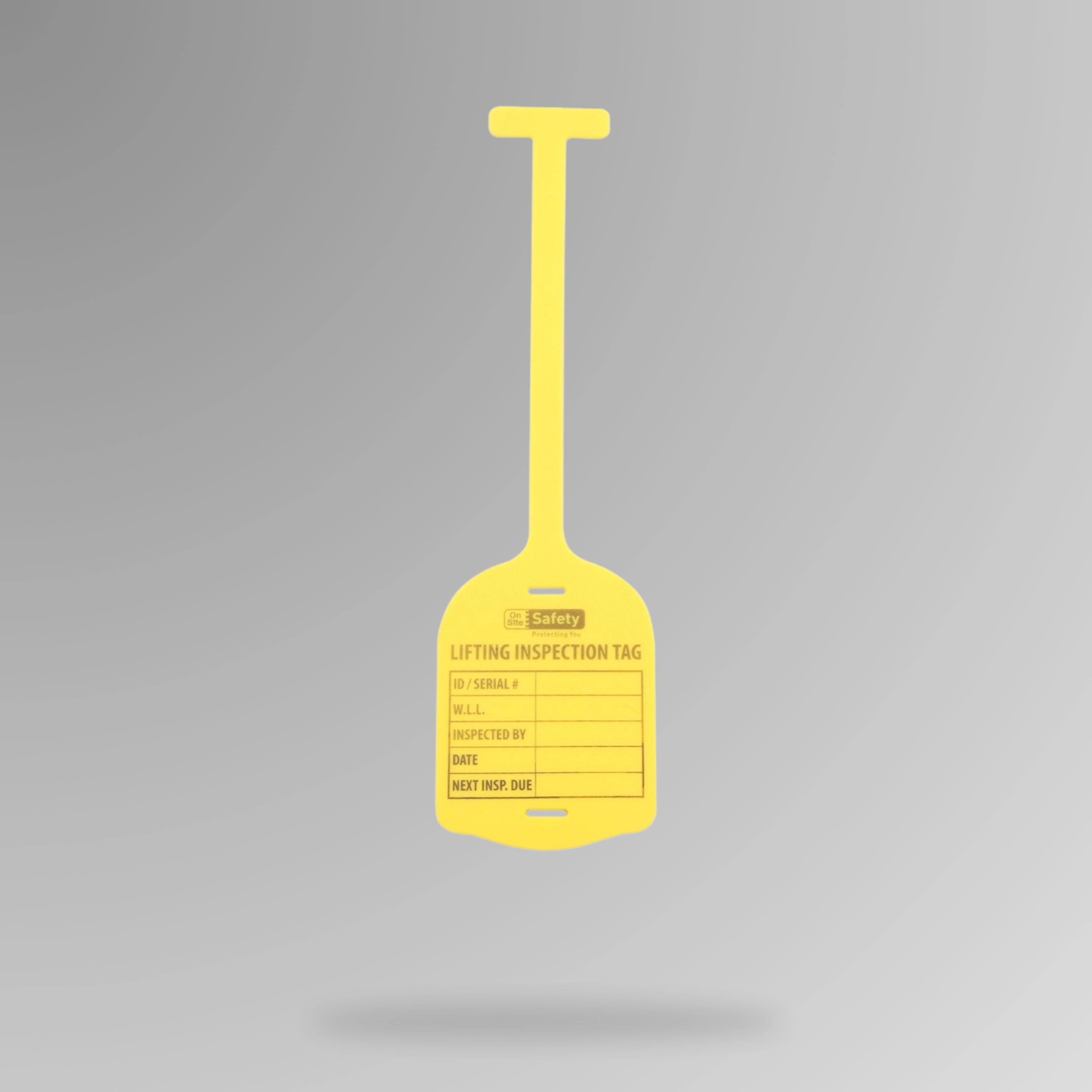 Yellow BST 212 silicone lifting inspection tag displayed upright showing resilient material and tracking fields