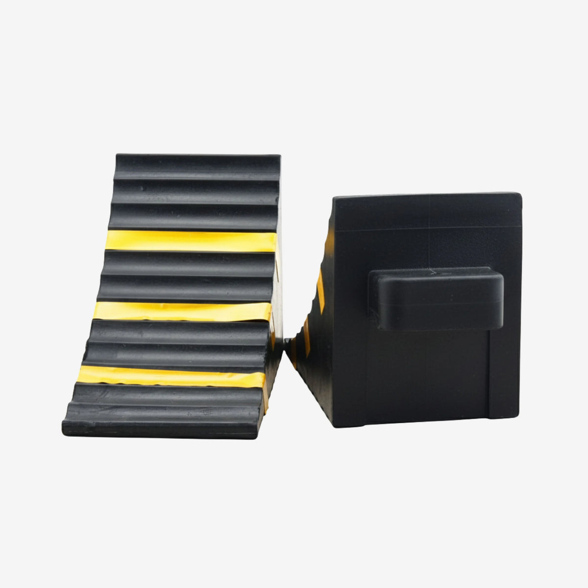 Black rubberised wheel chock shown layflat with dimensions of 250mm base, 150mm width and 190mm height. Grip pattern and yellow visibility strips visible. BVS 001. Brute Safety Products.