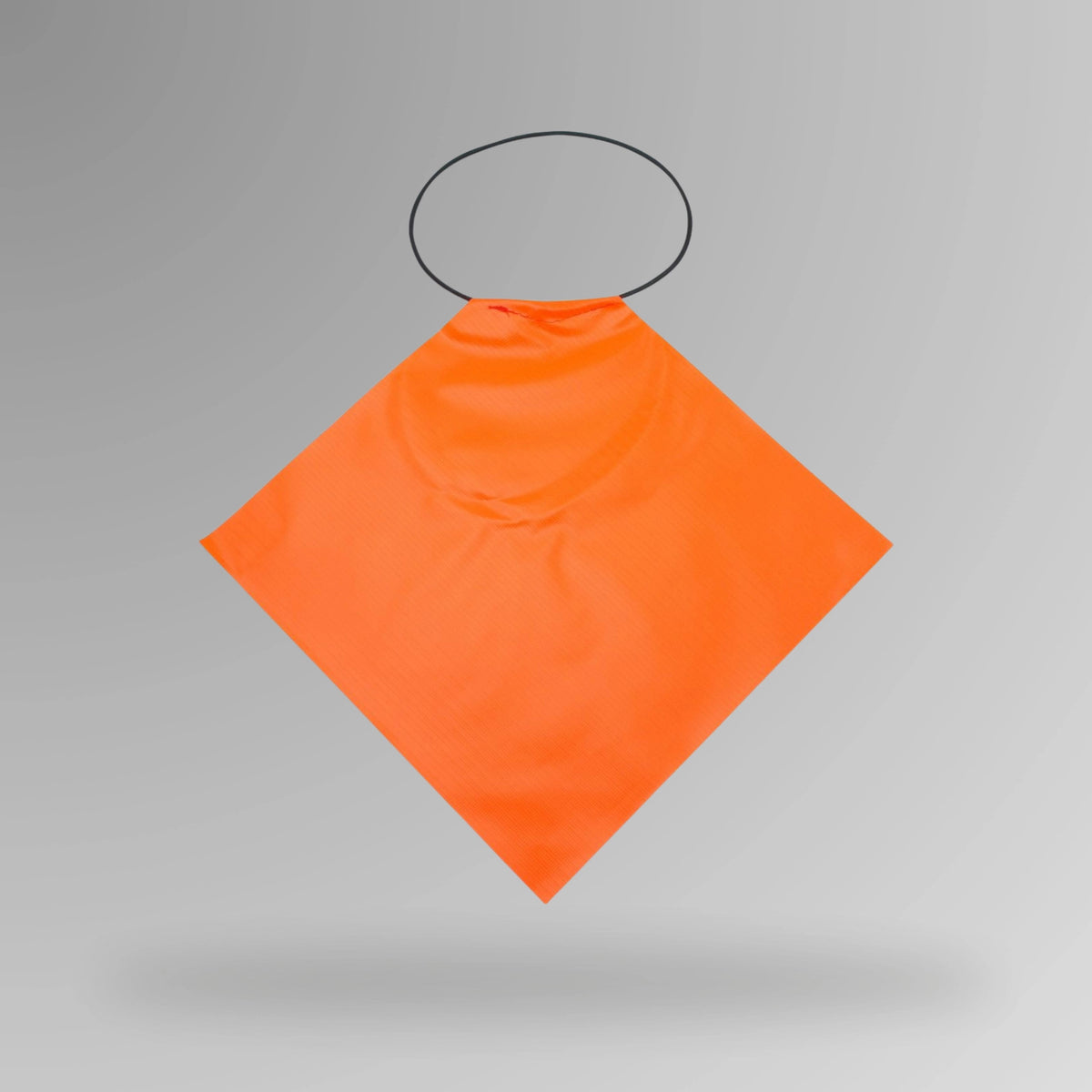 Upright view of neon orange long load flag displaying 300mm square dimensions with elastic loop attachment visible at corner