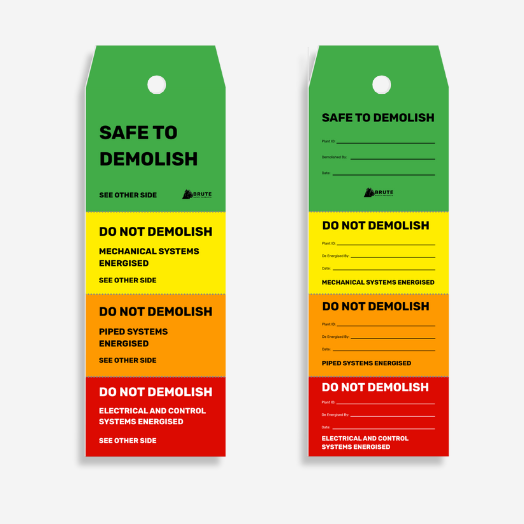FST 102 Four Stage Safe to Demolish Flange Tag laid flat revealing all four safety stages, decommissioning checklist, and tear off sections with full details