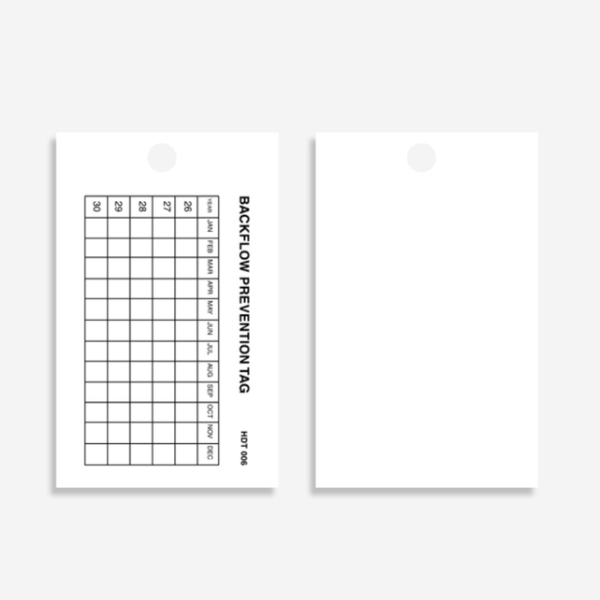 HDT 006 tag shown flat revealing compact 100 x 60mm dimensions with testing date fields and certification details