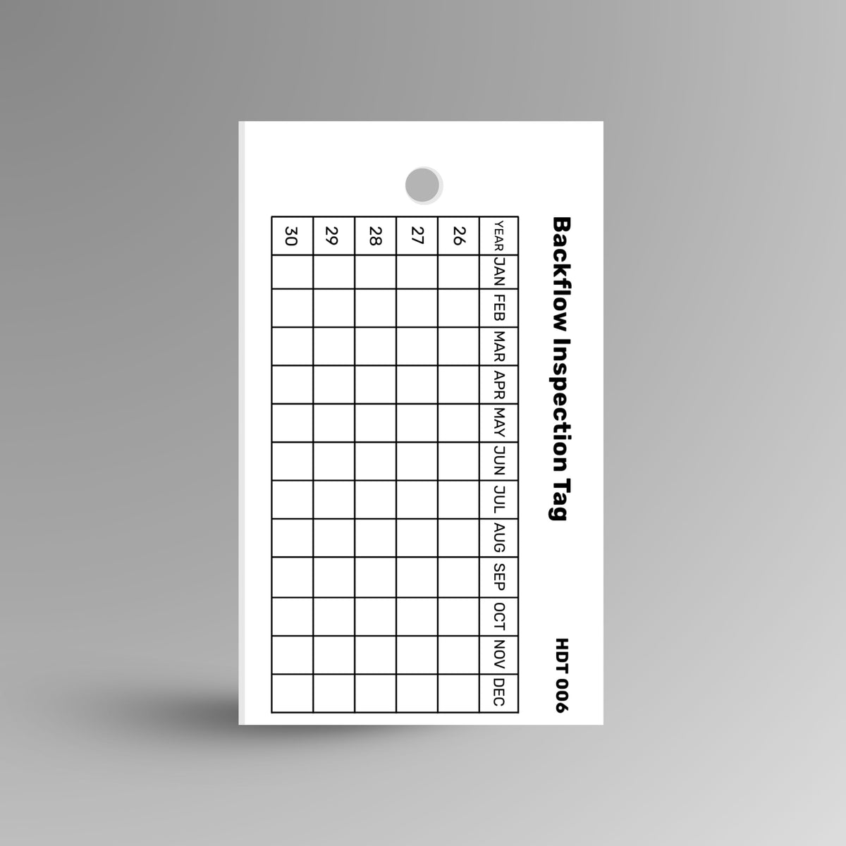 White Backflow Prevention tag displayed upright showing compliance information fields and attachment point