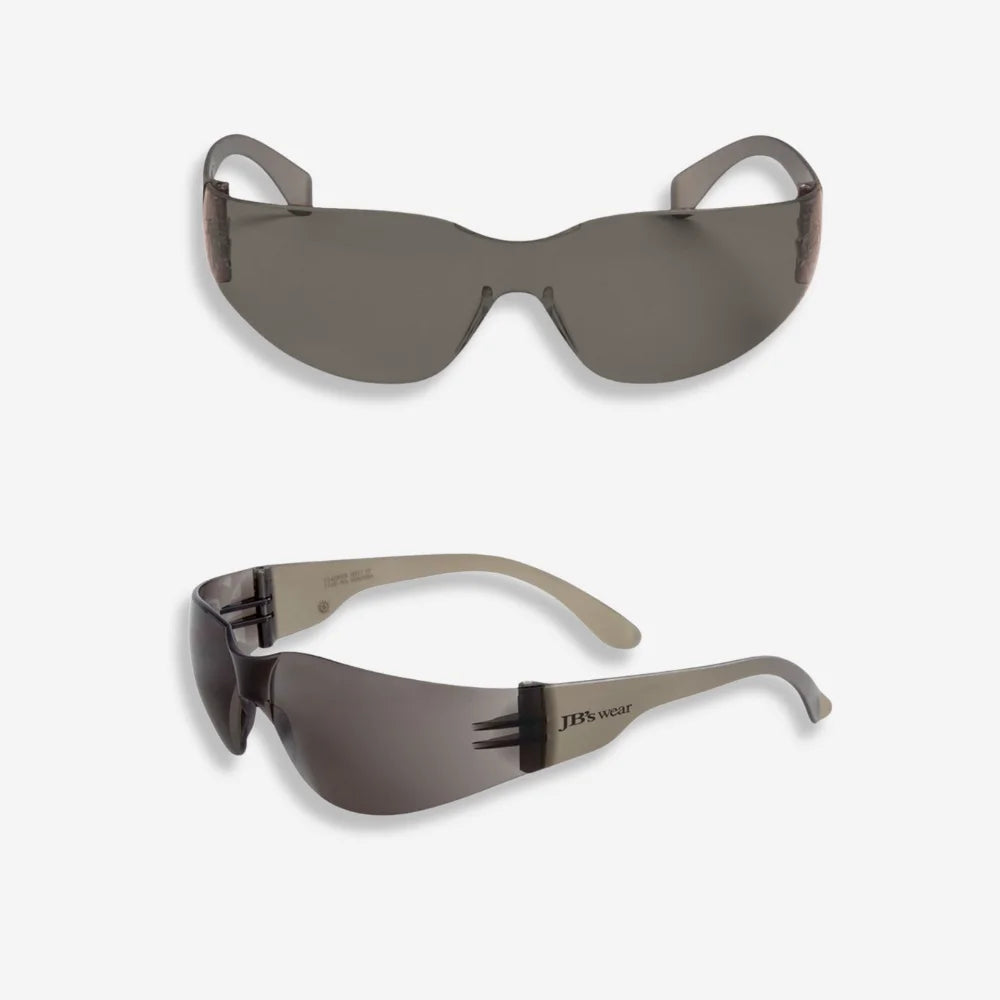 JB's Power Spec Smoke Lens Safety Glasses shown from side displaying smoke tinted single piece lens, side ventilation and polycarbonate construction
