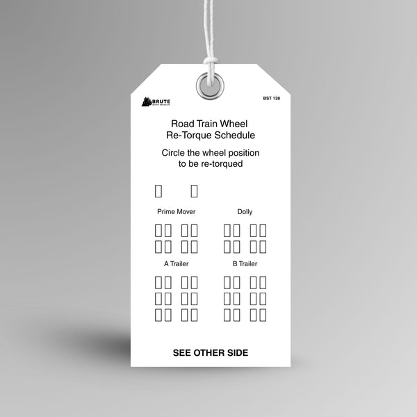 BST 138 Road Train Wheel Re-Torque Schedule tag hanging from white string through a metal eyelet, with wheel diagrams for prime mover, dolly, A Trailer and B Trailer.