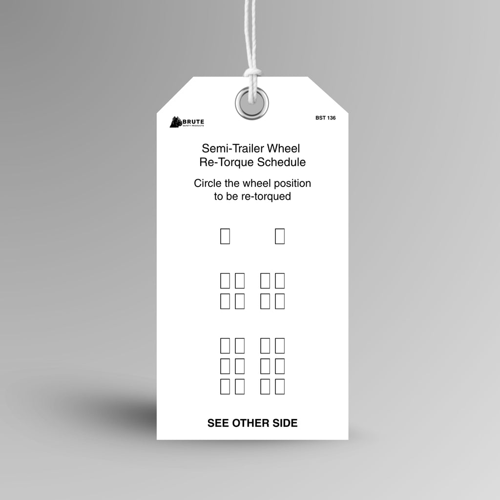 BST 136 Semi Trailer Wheel Re-Torque Schedule tag hanging from white string through a metal eyelet, showing a trailer wheel position diagram.