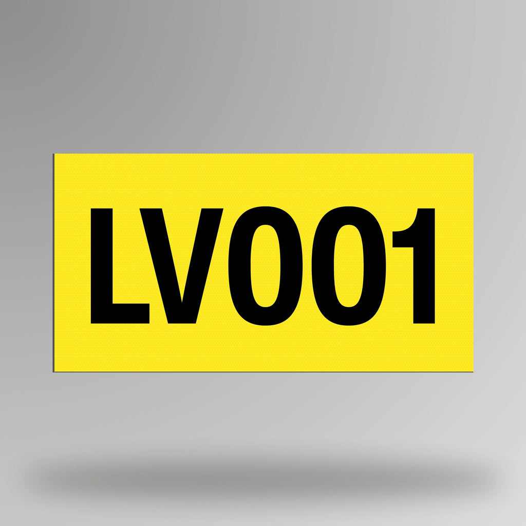 Yellow reflective magnetic asset decal displayed upright showing bold black printed asset number and magnetic backing